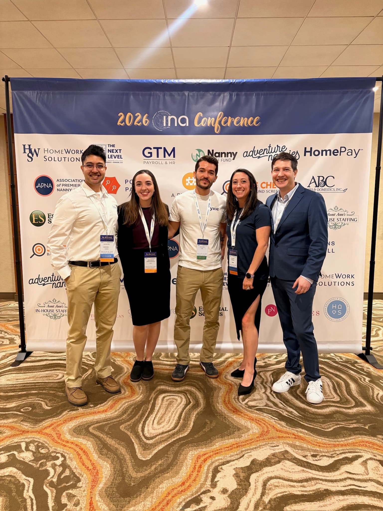 The Pyxie team with childcare professionals at the 2026 International Nanny Association conference.